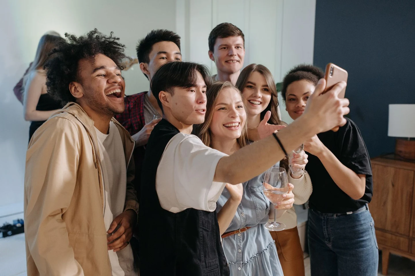 A group of friends gathering for a selfie